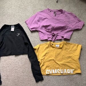 Gymshark Pink Tie-Front Crop, Mustard Logo Tee & Black Long-Sleeve Crop